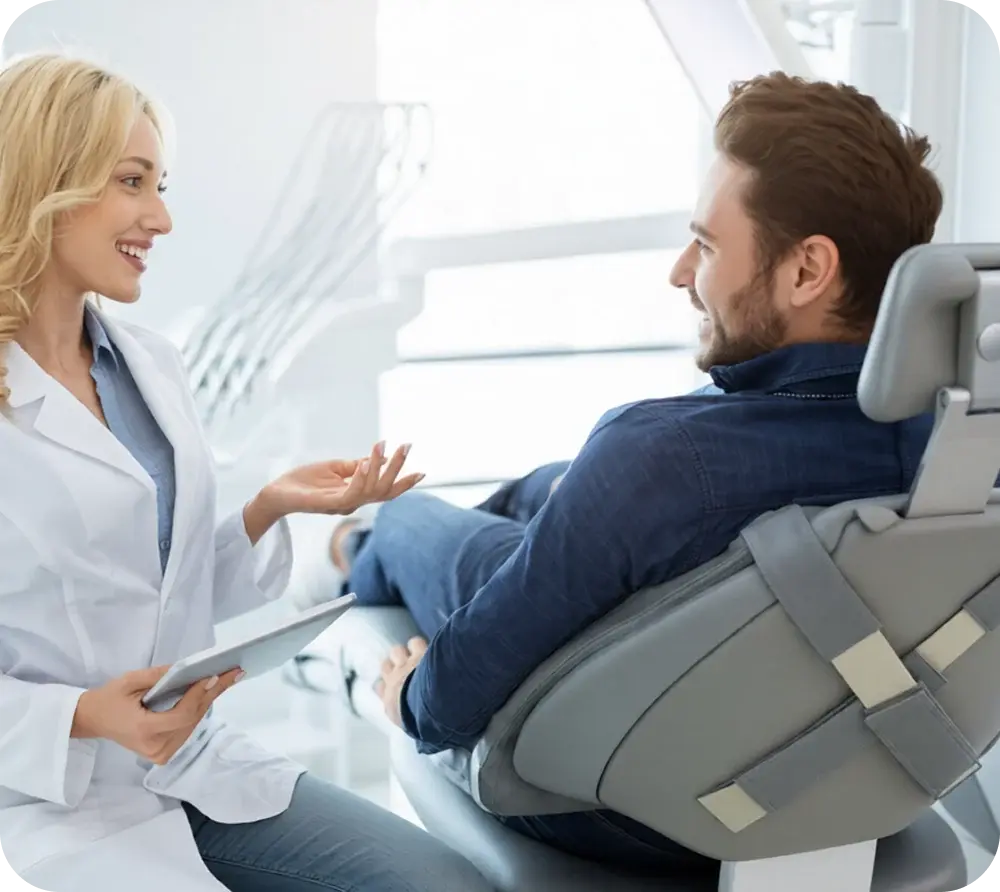 Dentist explaining a treatment to a patient
