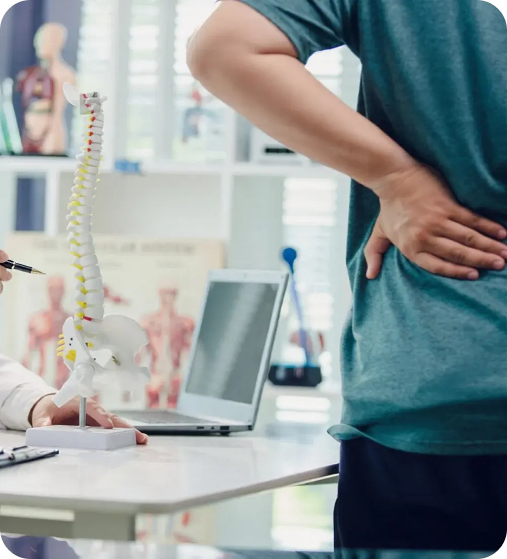 Patient holding a sore shoulder