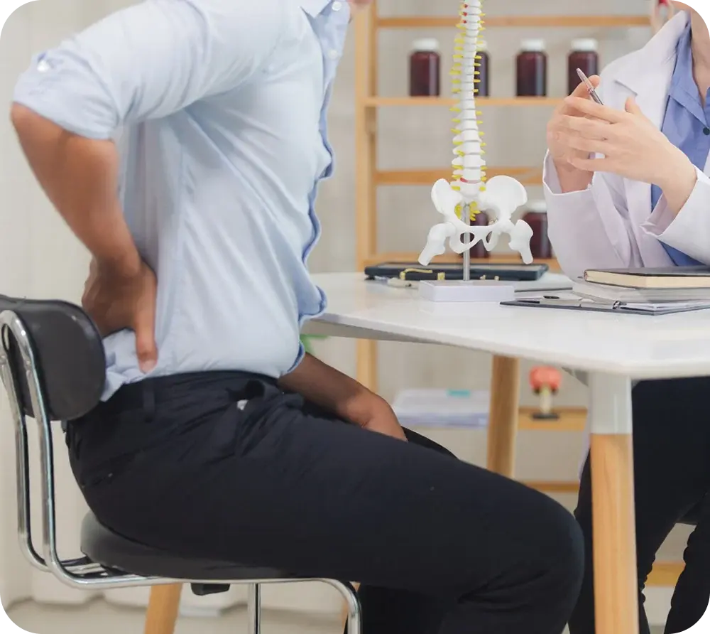Patient describing back pain to a provider