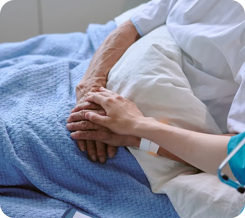 Caregiver supporting an older patient