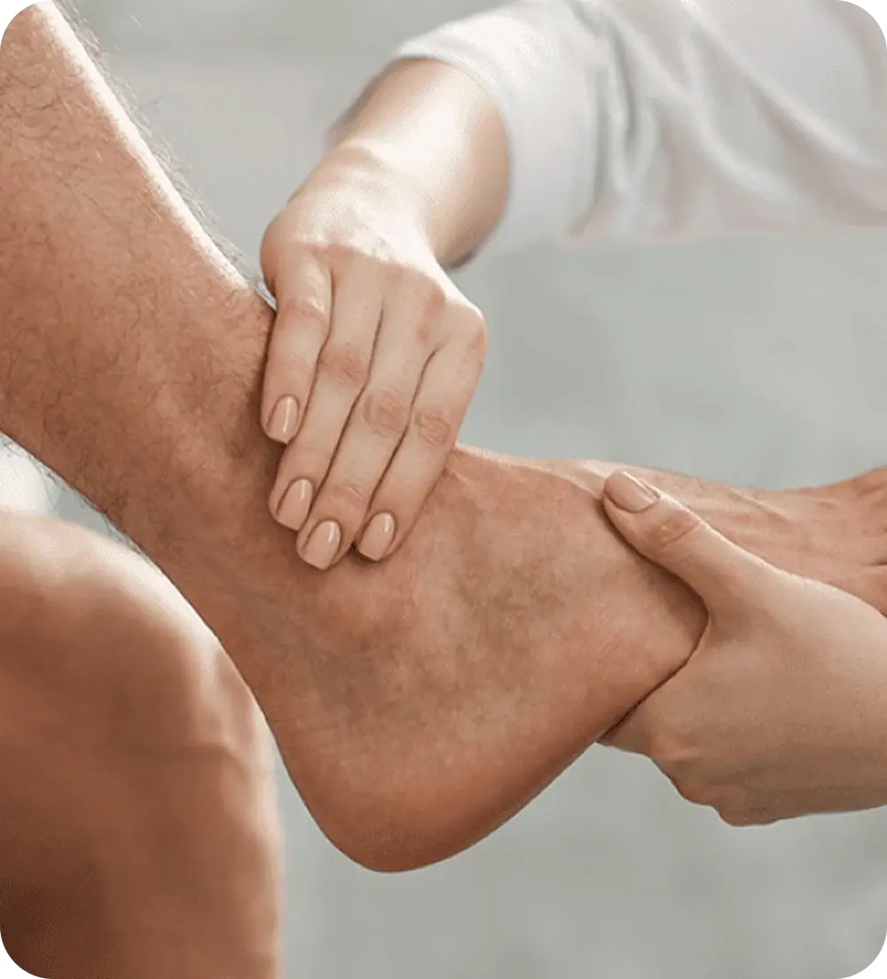 Patient holding a sore foot