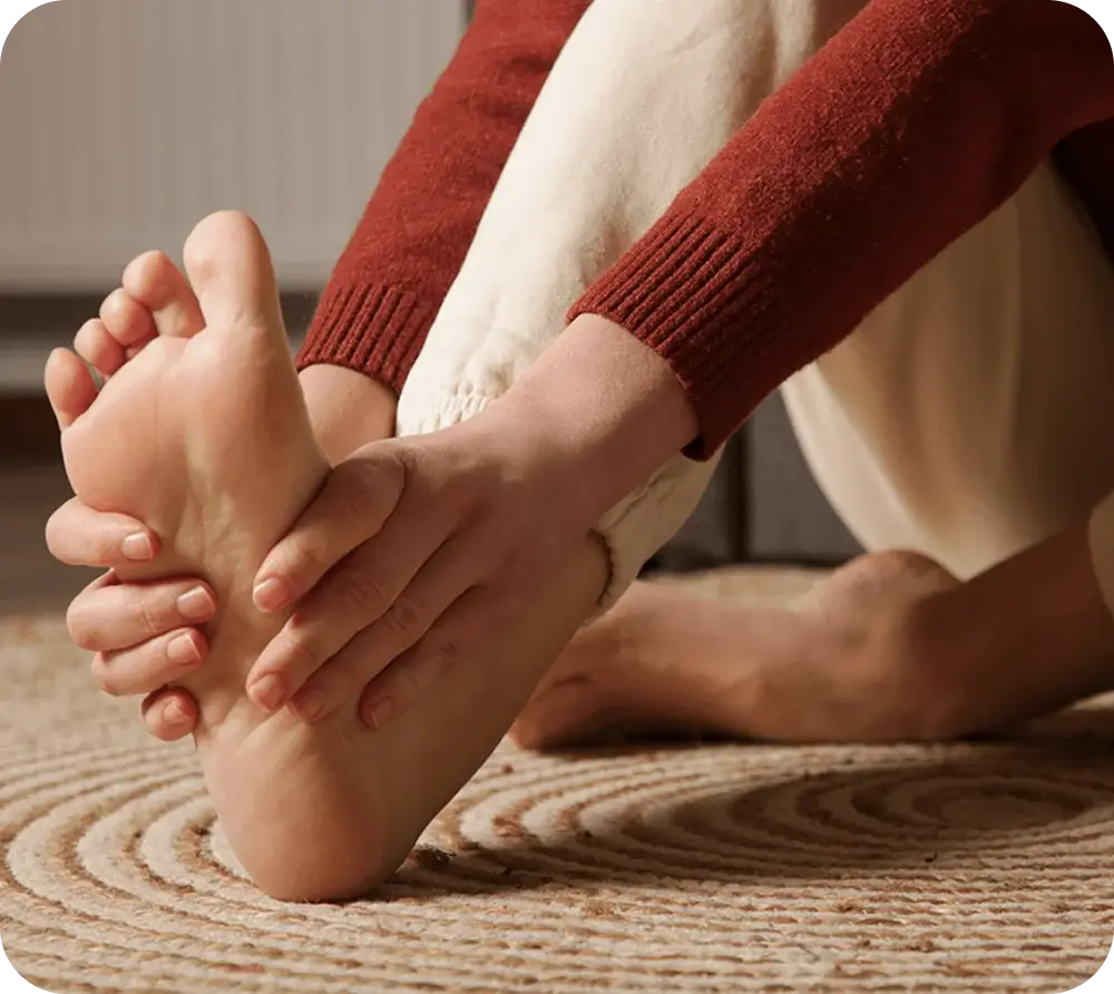 Podiatrist examining a patient’s foot
