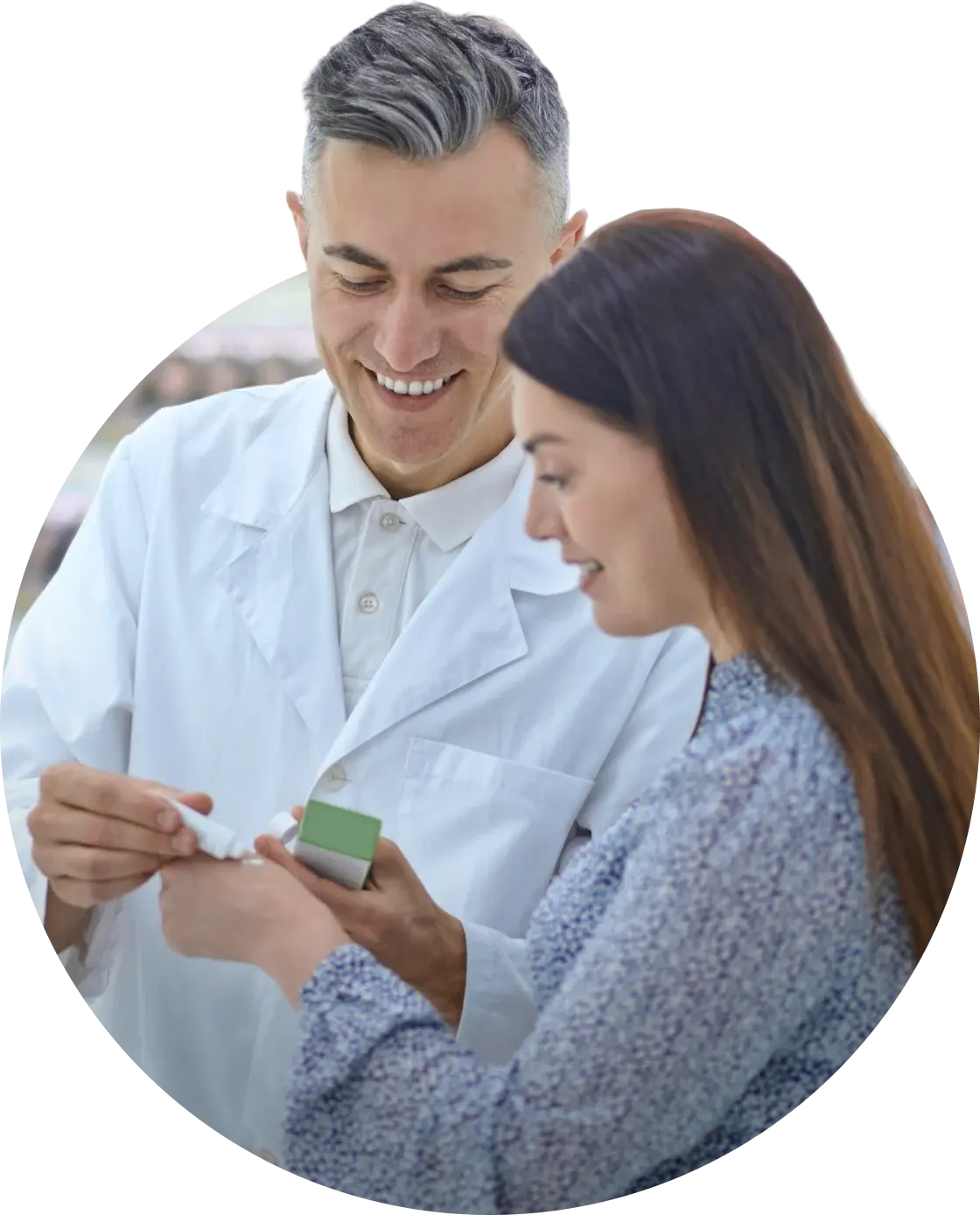 Pharmacist explaining a medication to a patient